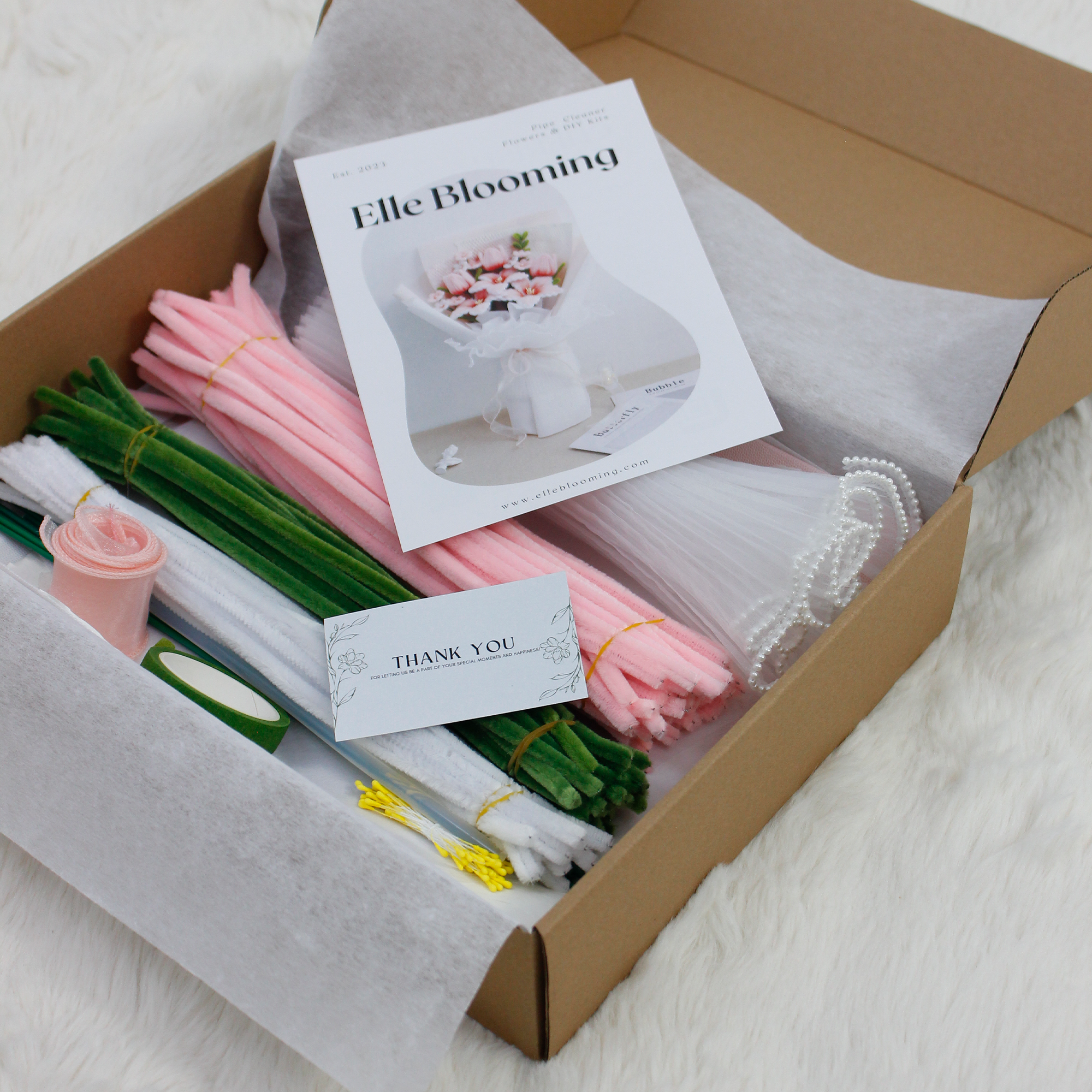 DIY Kit for making pink tiger lilies bouquet using fuzzy pipe cleaners and clear instructions from Elle Blooming. A stunning, heartfelt handmade gift for loved ones. This bouquet lasts forever.