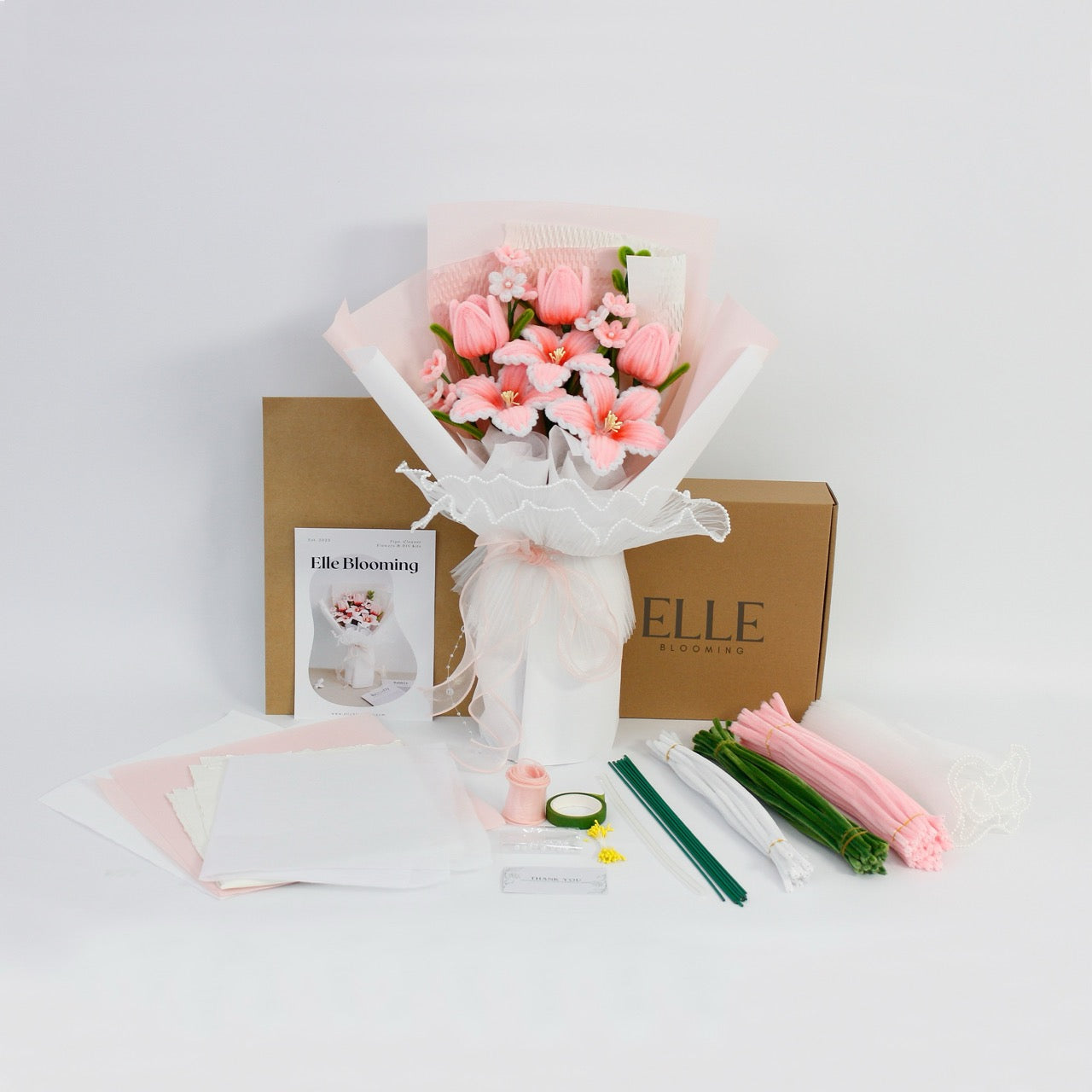 DIY Kit for making pink tiger lilies bouquet using fuzzy pipe cleaners and clear instructions from Elle Blooming. A stunning, heartfelt handmade gift for loved ones. This bouquet lasts forever.