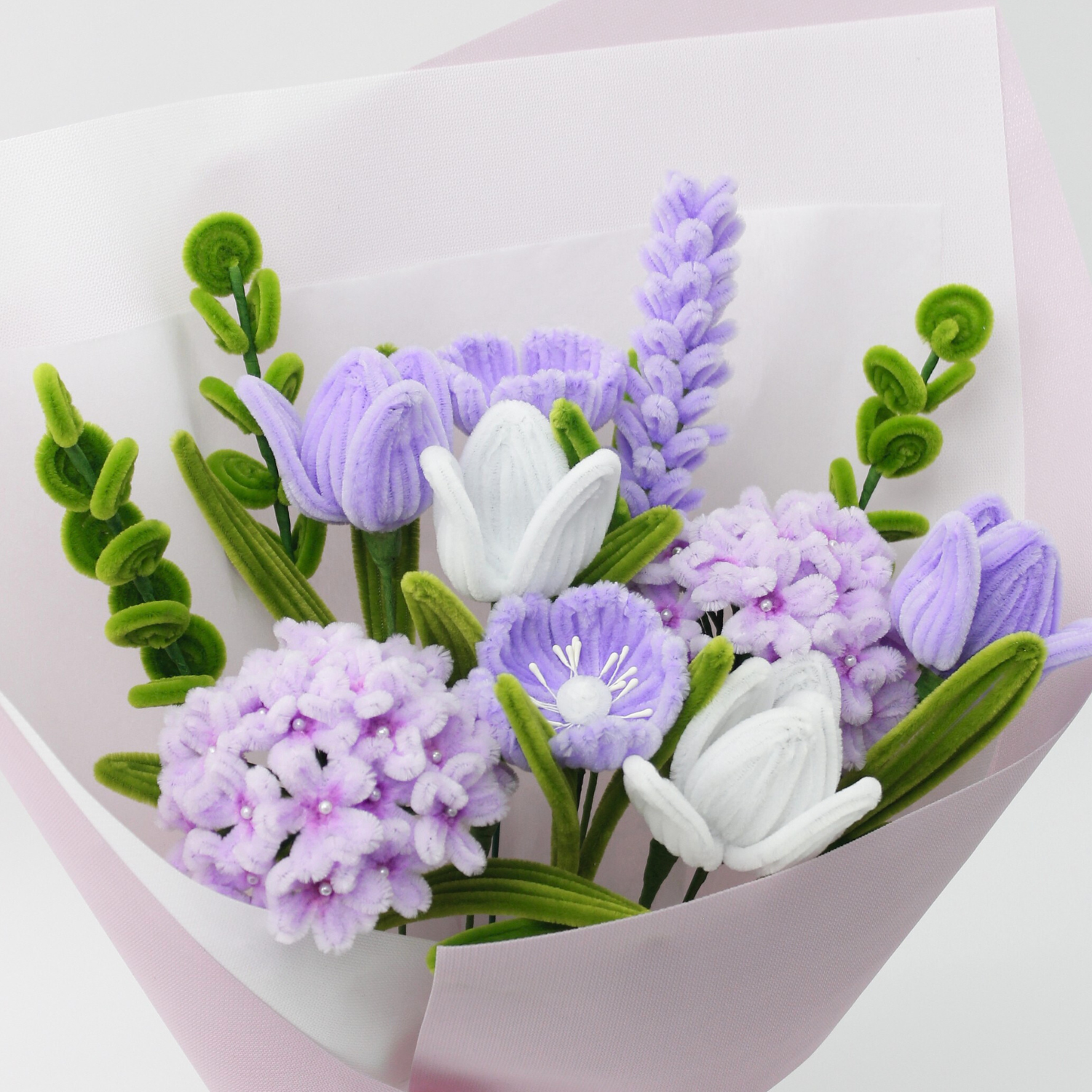 Handmade everlasting bouquet with purple and white flowers, crafted from pipe cleaners, elegant finished flower arrangement gift in Australia for birthdays, anniversaries, and special occasions.