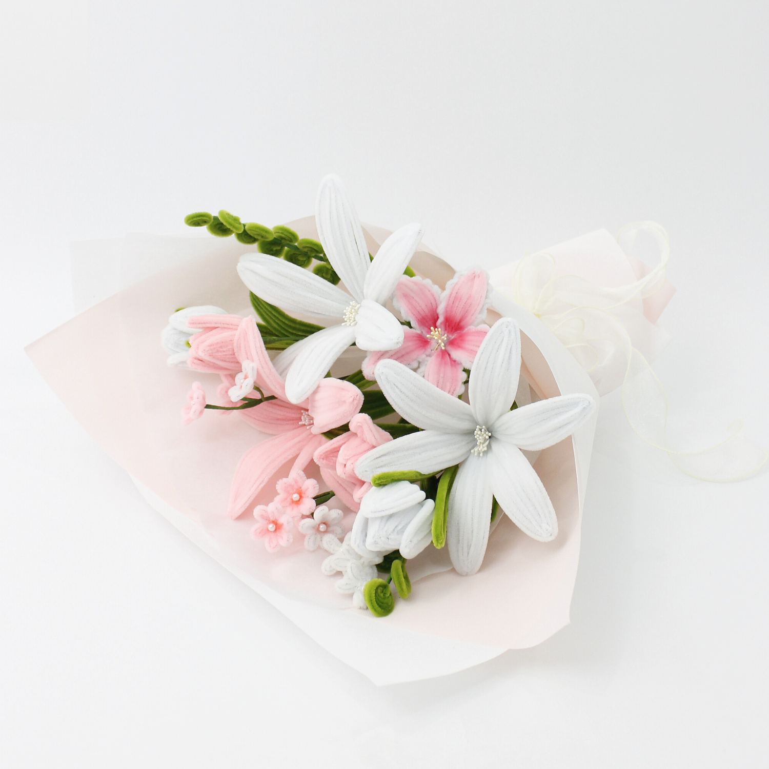 Handmade everlasting bouquet with white and pastel pink lilies, crafted from pipe cleaners, elegant finished flower arrangement gift in Australia for weddings, birthdays, and anniversaries.