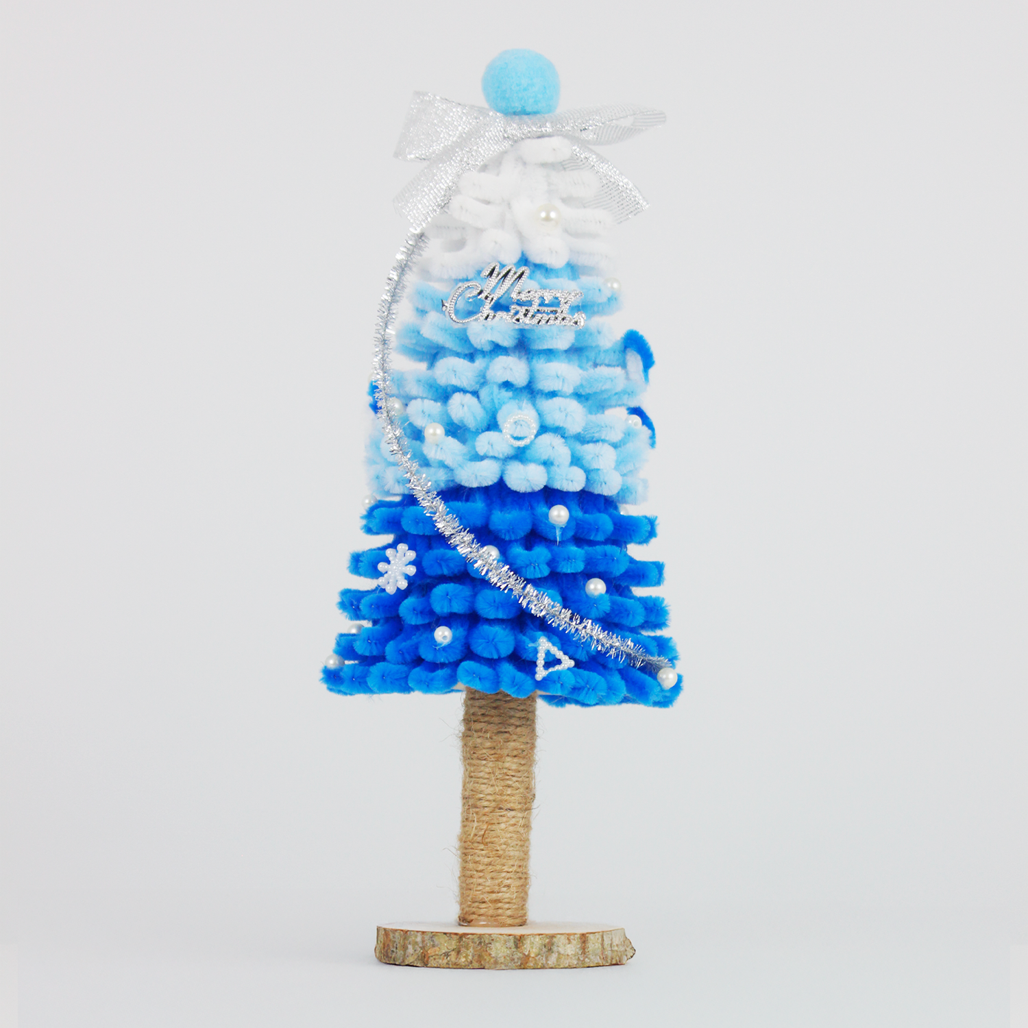Ombre blue and white pipe cleaner Christmas tree with silver bow and tinsel—perfect for winter holiday home decoration or gifts.