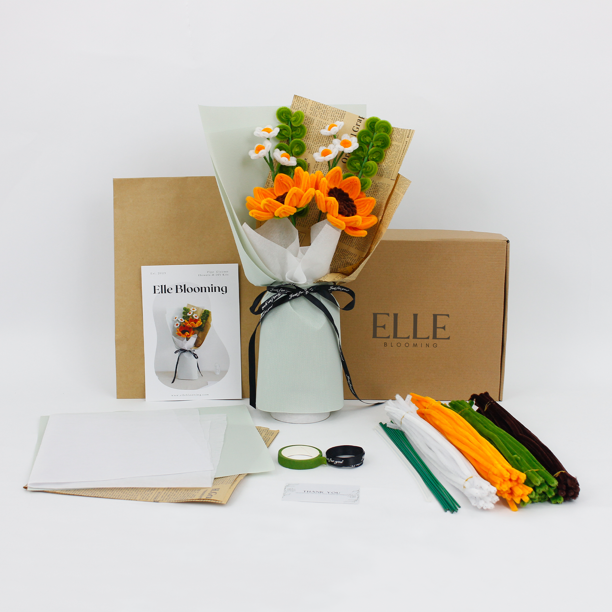 Orange Sunflowers DIY Kit with all crafting materials and wrapping, perfect handmade gift from Elle Blooming. Includes pipe cleaners, bouquet tutorial, floral packaging, and gift box.
